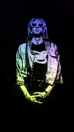 Kurt Cobain 戴著太陽眼鏡，在黑色背景上呈現螢光綠和紫色燈光。