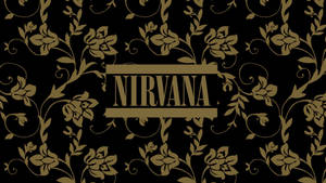 金色花卉圖案，'NIRVANA' 文字居中於黑色背景上。