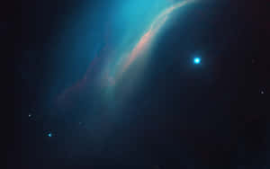 一個充滿活力的宇宙星雲，帶有發光的藍色和粉紅色雲彩，以及深空中的一顆明亮星星。 — 太空 壁紙