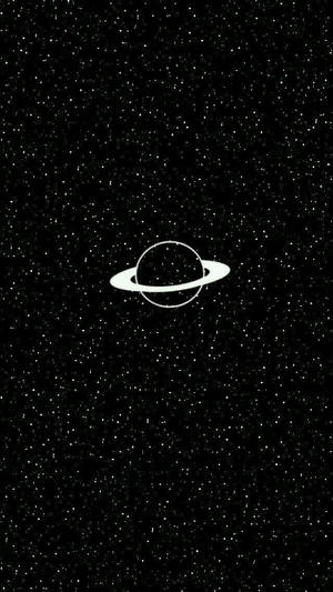土星帶有光環，位於繁星點點的夜空中央。