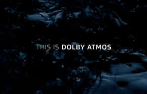 深色水波紋上顯示白色文字「THIS IS DOLBY ATMOS」 — MacBook Air 15 壁紙