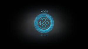 Kodi媒體播放器標誌，帶有發光藍色圓圈和文字，位於深色背景上