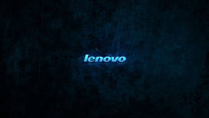 發光藍色 Lenovo 標誌在帶有刮痕的深色紋理牆上。