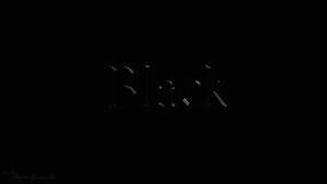 Black呢個字喺深色數位字體中柔和咁發光。