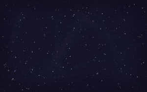繁星點點的夜空，有無數星星和微弱的宇宙雲。