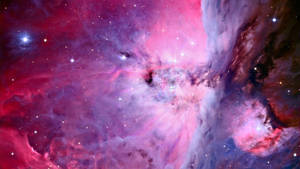 充滿活力的宇宙星雲，帶有發光的粉紅色、紫色和藍色雲彩以及明亮的星星。