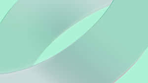 抽象極簡設計，重疊的薄荷綠色和白色彎曲平面。