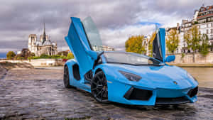 藍色林寶堅尼Aventador在巴黎聖母院附近的鵝卵石上打開車門。 — 汽車 壁紙