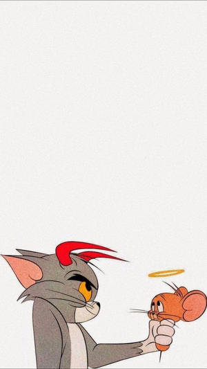 魔鬼角嘅貓 Tom 捉住老鼠 Jerry 嘅尾巴，Jerry 頭上面有光環。