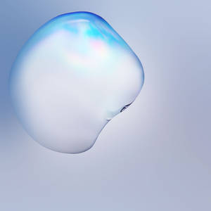 一個漂浮的半透明藍色氣泡帶有彩虹色亮點。