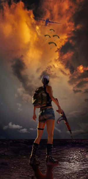 持步槍的士兵看著降落傘在火紅的天空下下降。