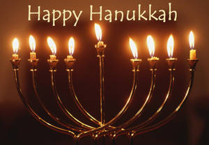 金色 menorah 配上點燃的蠟燭，用於慶祝光明節。 — 慶祝 壁紙