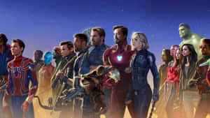 Marvel 超級英雄與盟友在繁星點點的暮色天空下並肩而立。 — 驚奇隊長 壁紙
