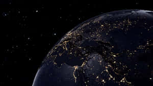 從太空俯瞰地球的夜景，城市燈光與星星