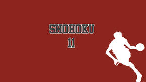 白色剪影，籃球運動員運球，帶有「SHOHOKU 11」文字在紅色背景上。