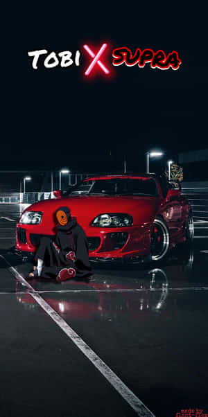 動畫角色 Tobi 坐在霓虹燈下濕漉漉的停車場中，一輛紅色 Supra 車旁。