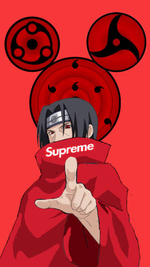 身穿紅色斗篷、擁有寫輪眼的動漫角色指向前方。 — 火影忍者 supreme 壁紙
