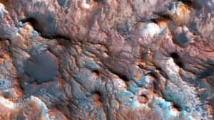 火星崎嶇表面，帶有鐵鏽色和藍綠色礦物形成。 — 火星 GIF 壁紙