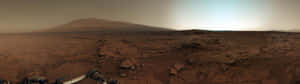 火星表面，岩石地形，前景有機械設備。 — 32:9 壁紙