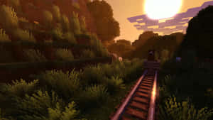 Minecraft火車軌道穿過夕陽下的草坡。