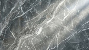 帶有白色紋理和柔和光線反射的深灰色大理石表面。 — 灰色美學 GIF 壁紙