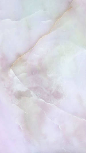 粉紅色和白色大理石特寫，帶有金色紋理