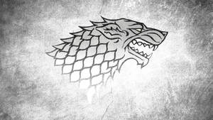 《權力遊戲》中的冰原狼徽章，背景為裂紋混凝土 — 灰色 GIF 壁紙
