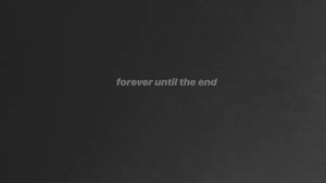 深灰色紋理背景，中央有微弱文字顯示「forever until the end」。 — 灰色美學 GIF 壁紙