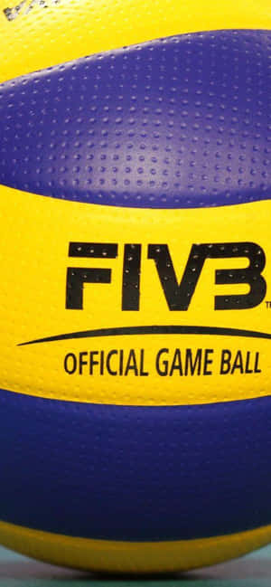 FIVB官方排球特寫，帶有黃色和藍色面板。 — OnePlus 壁紙