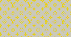 淺灰色背景上的黃色 Louis Vuitton 字母組合圖案。
