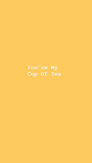 黃色背景，白色文字寫著 You're My Cup Of Tea