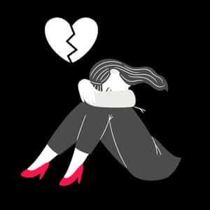 一個人在悲傷中蜷縮，上方有一顆破碎的心。 — 心碎 GIF 壁紙