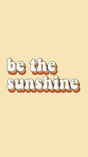 勵志短語 be the sunshine 以復古3D文字顯示在米色背景上 — 友誼日 壁紙