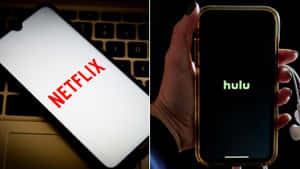 手拿著帶有 Hulu 標誌的電話，旁邊是顯示 Netflix 標誌的手提電腦。