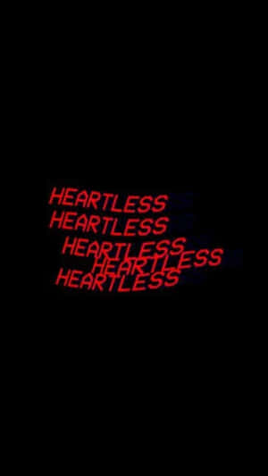 黑色背景上重複的紅色發光文字 'HEARTLESS'。 — 紅色美學 壁紙