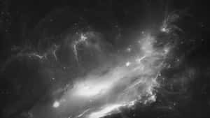 一個黑白星雲，在深空中有發光的雲和星星。