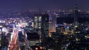東京夜景，發光的建築物和繁忙的街道。 — 夜景城市 壁紙