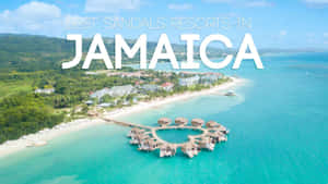 牙買加 Sandals Resorts 的鳥瞰圖，展現碧綠海水和水上平房。 — 牙買加海灘 壁紙