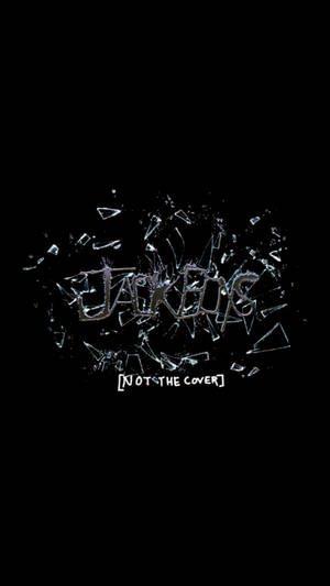 碎裂玻璃效果拼出 JACKETS，下方有文字 NOT THE COVER。