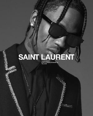 Travis Scott 身穿帶銀色飾邊的黑色西裝外套，戴著太陽眼鏡 — Marc jacobs GIF 壁紙