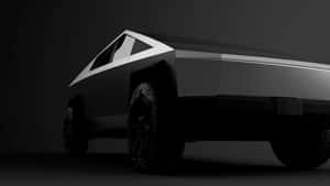 時尚黑色Tesla Cybertruck，棱角設計，在昏暗的攝影棚燈光下。 — Tesla GIF 壁紙