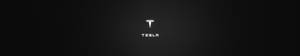 深色背景上的白色Tesla標誌 — Tesla GIF 壁紙