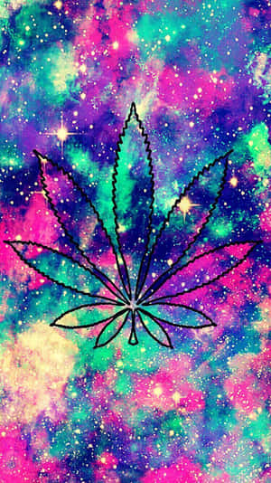 黑色輪廓的大麻葉在色彩繽紛的星空背景上。