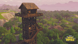 Fortnite 瞭望塔俯瞰日落時分的森林山谷。