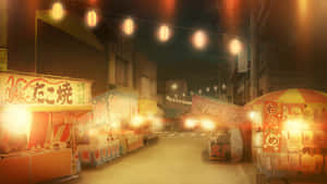 日本夜市街道，發光的美食攤位和紙燈籠。