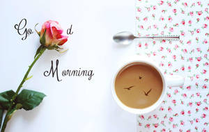 咖啡杯帶有鳥類剪影，旁邊有粉紅玫瑰和「Good Morning」文字。
