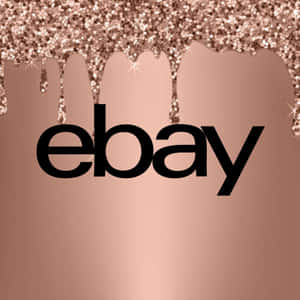 頂部有玫瑰金色閃粉滴落的 eBay 標誌