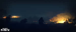 士兵在草叢中移動，爆炸照亮夜空。 — 火 壁紙