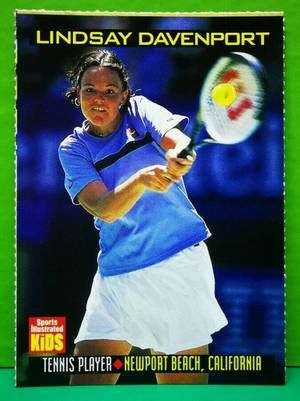 網球運動員 Lindsay Davenport 在比賽中揮拍擊球。 — 網球 壁紙