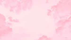 粉紅水彩雲朵漂浮在柔和天空中